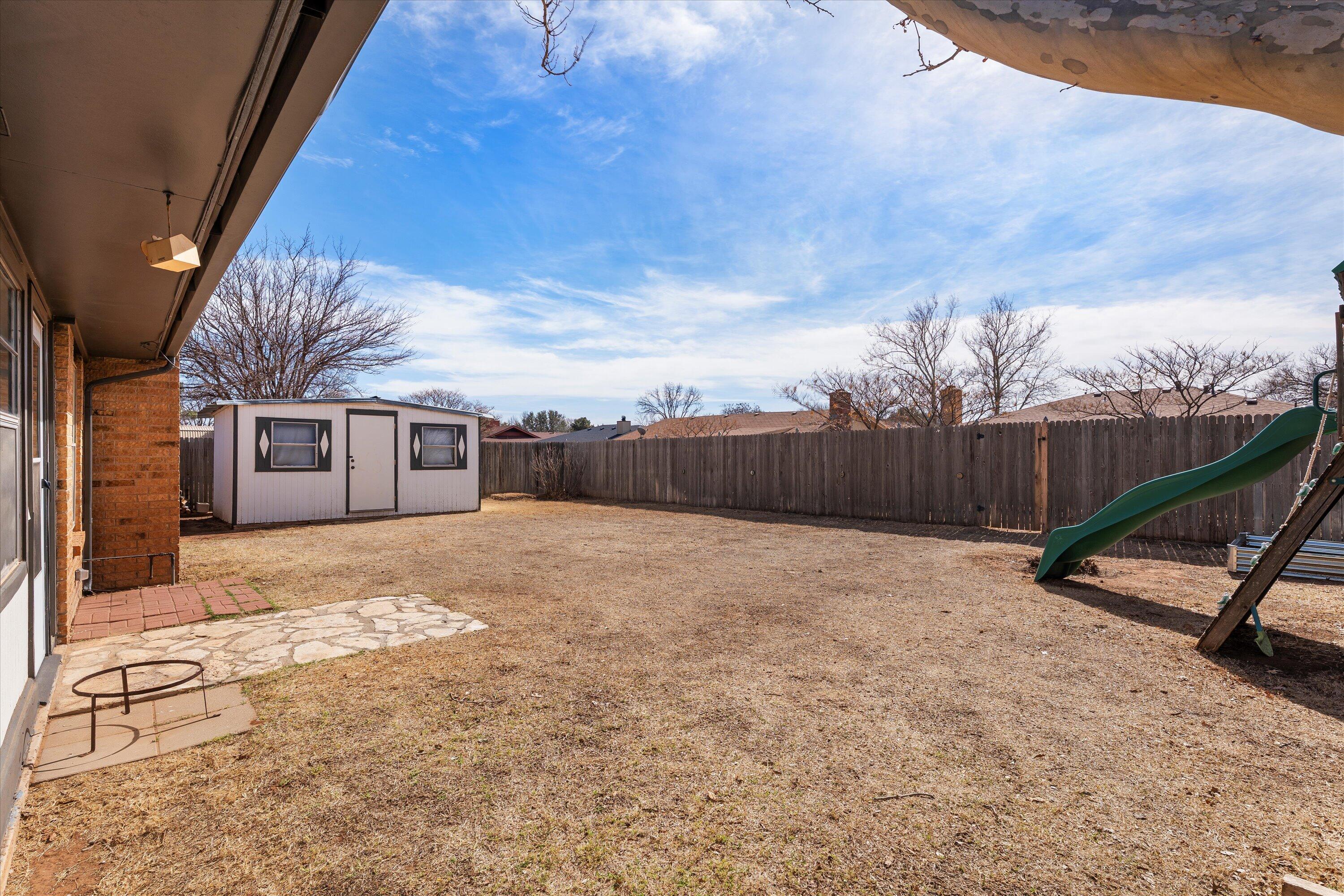 5223 91st Street Lubbock, TX 79424 - Photo 28 of 29 a view of a backyard
