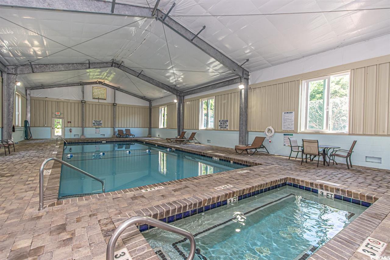 501 Maison Drive, Unit E5 Myrtle Beach, SC 29572 - Photo 34 of 39 View of pool featuring an indoor hot tub