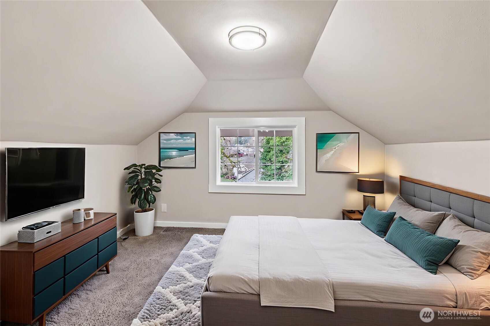 802 Northwest 5th Circle Camas, WA 98607 - Photo 18 of 26 a bedroom with a bed and a flat screen tv