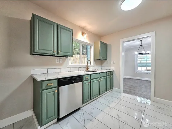 a kitchen with a sink and a cabinets