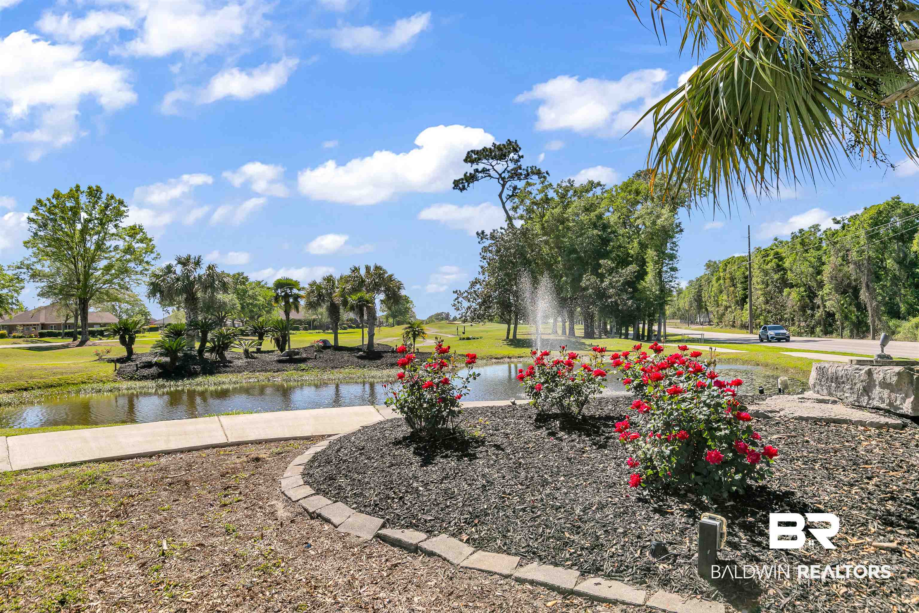 10140 Chipper Lane Foley, AL 36535 - Photo 64 of 72 View of community featuring a lawn and a water view