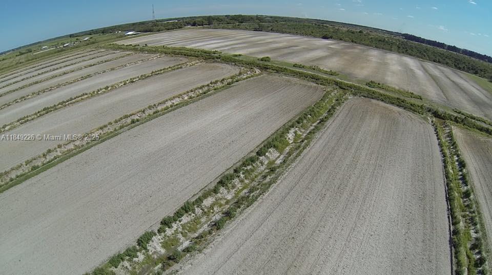 595 North Header Canal Road Fort Pierce, FL 34945 - Photo 12 of 36 a view of a swimming pool with a stairs