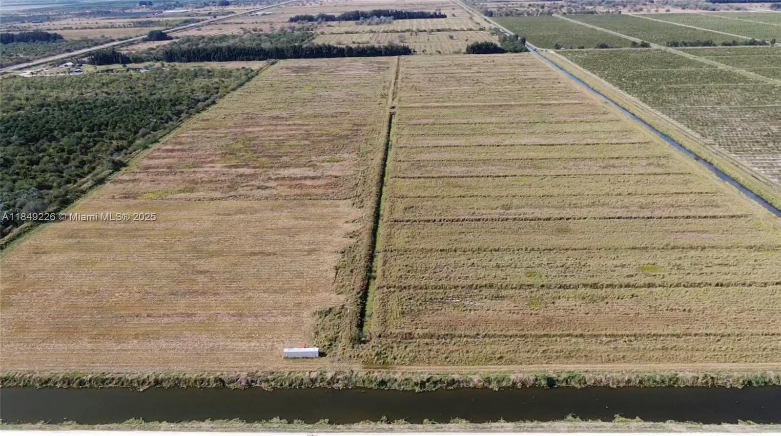 595 North Header Canal Road Fort Pierce, FL 34945 - Photo 14 of 36 a view of wooden door