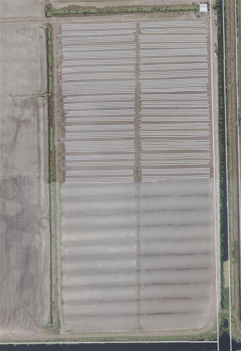 595 North Header Canal Road Fort Pierce, FL 34945 - Photo 17 of 36 a close up of a white shower