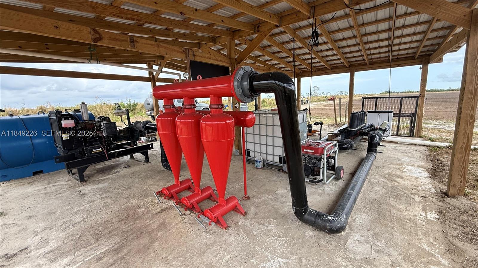 595 North Header Canal Road Fort Pierce, FL 34945 - Photo 23 of 36 a view of a room with gym equipment
