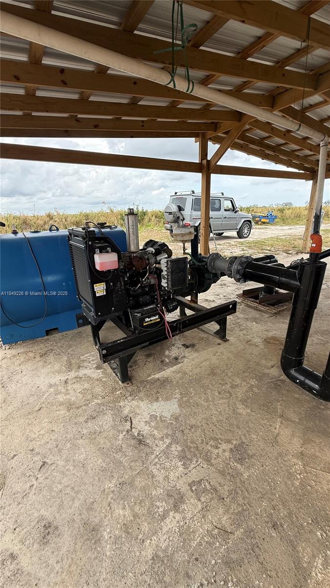 595 North Header Canal Road Fort Pierce, FL 34945 - Photo 24 of 36 a view of a room with gym equipment