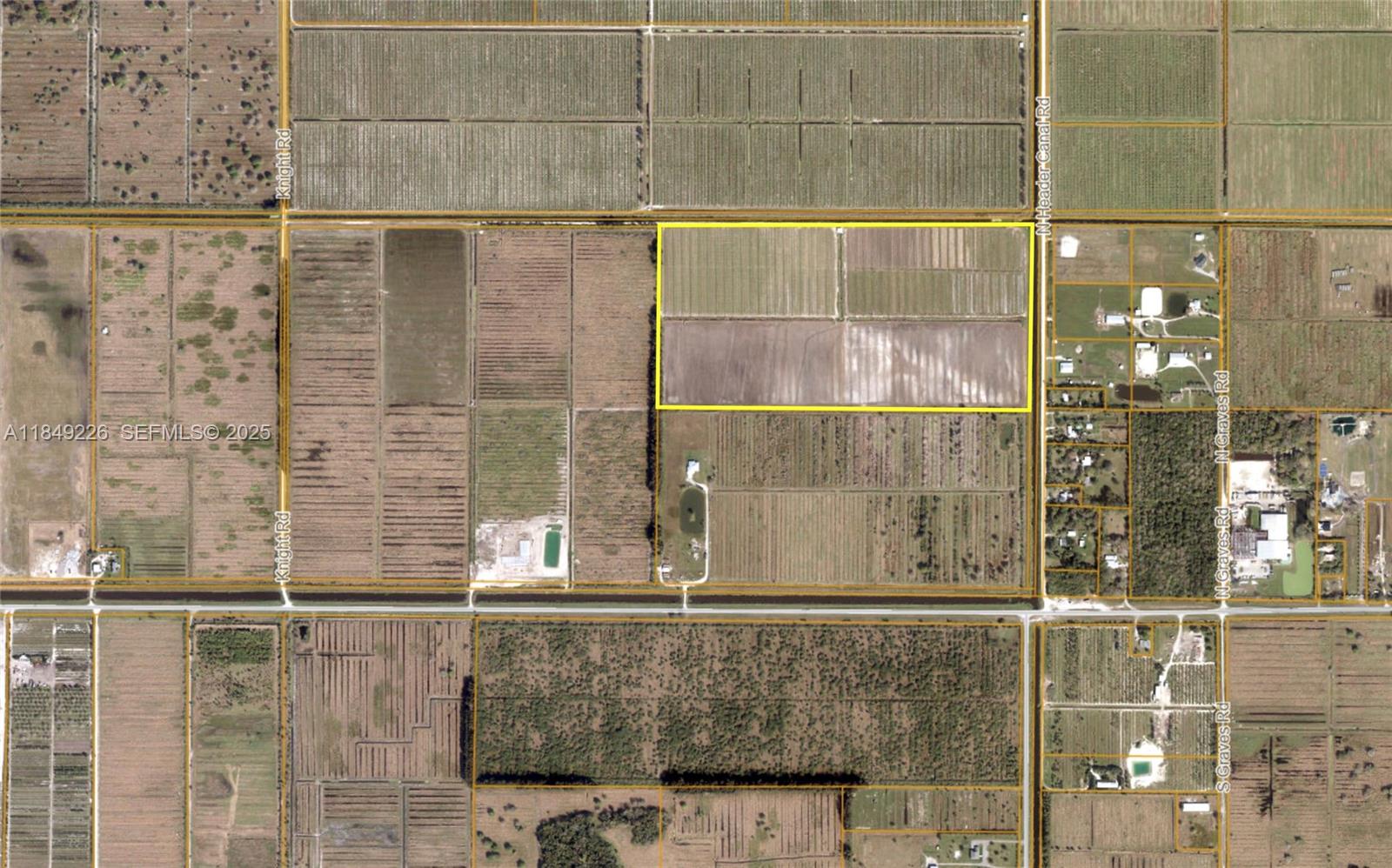 595 North Header Canal Road Fort Pierce, FL 34945 - Photo 28 of 36 a bathroom with a shower