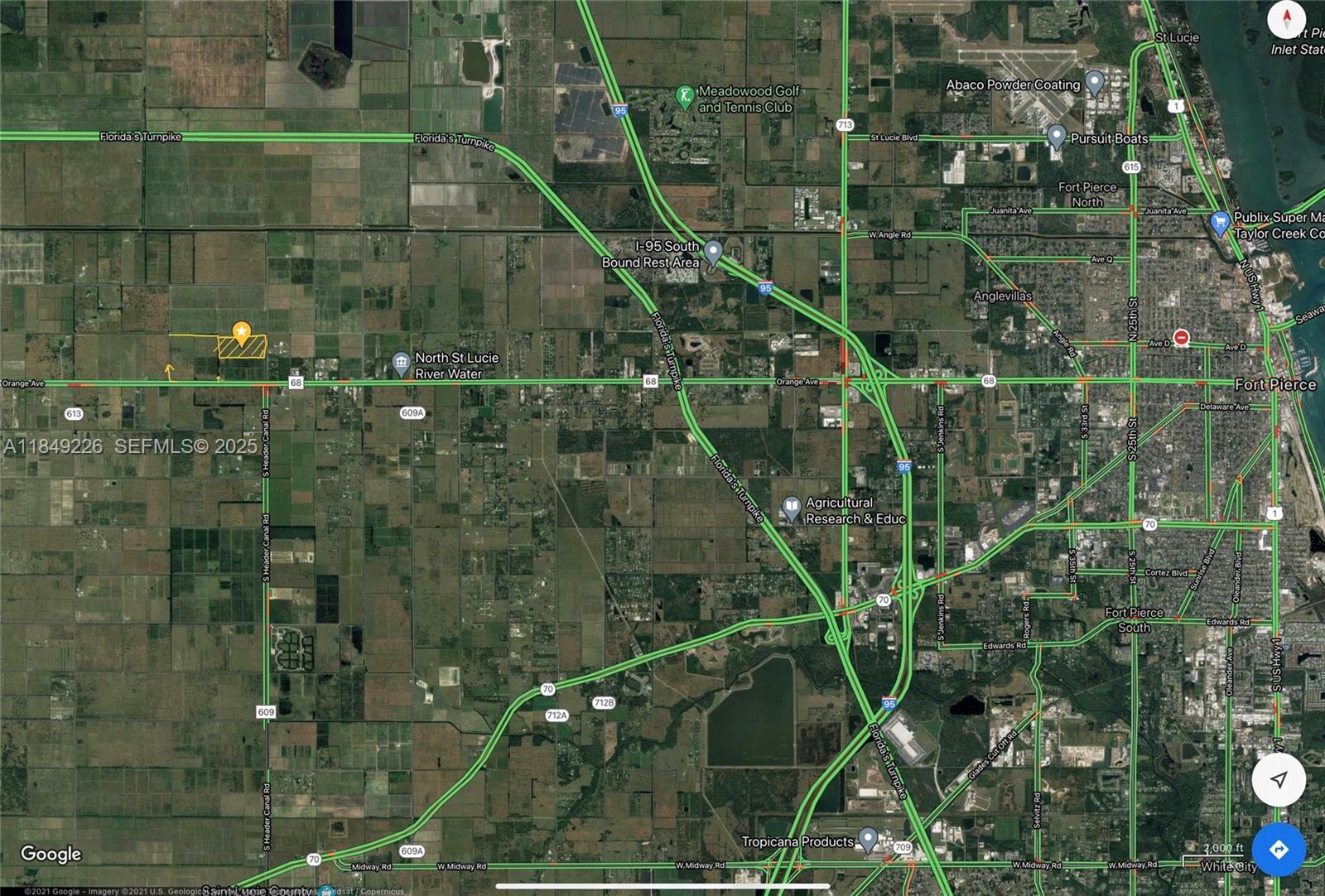 595 North Header Canal Road Fort Pierce, FL 34945 - Photo 31 of 36 a close view of water heater room