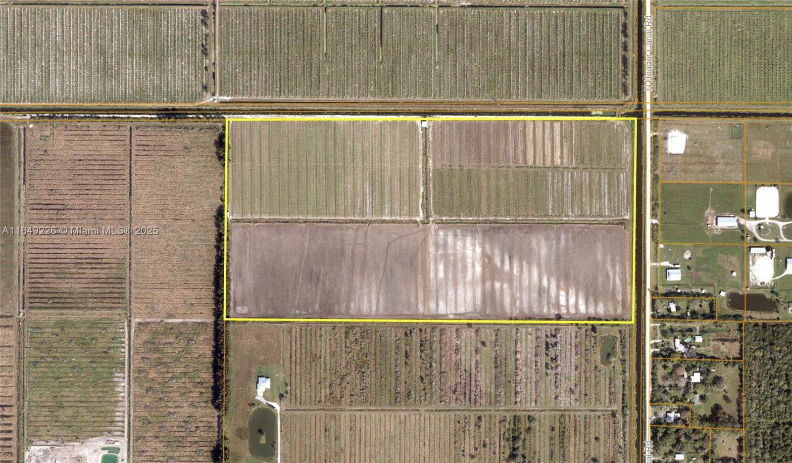 595 North Header Canal Road Fort Pierce, FL 34945 - Photo 9 of 36 a view of a bathroom with a shower