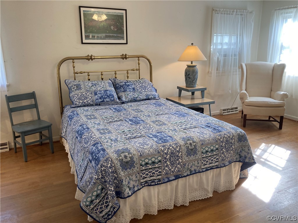 3401 Ellsworth Road Richmond, VA 23235 - Photo 11 of 39 a bedroom with a bed and chair