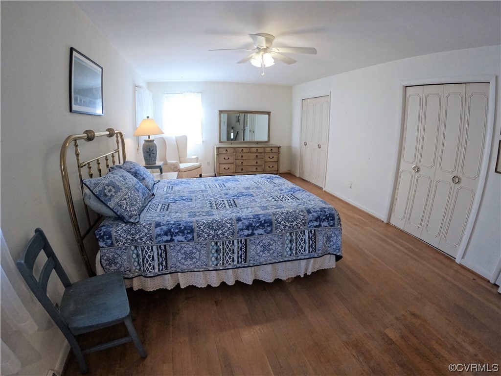 3401 Ellsworth Road Richmond, VA 23235 - Photo 16 of 39 a living room with a bed furniture and a flat screen tv