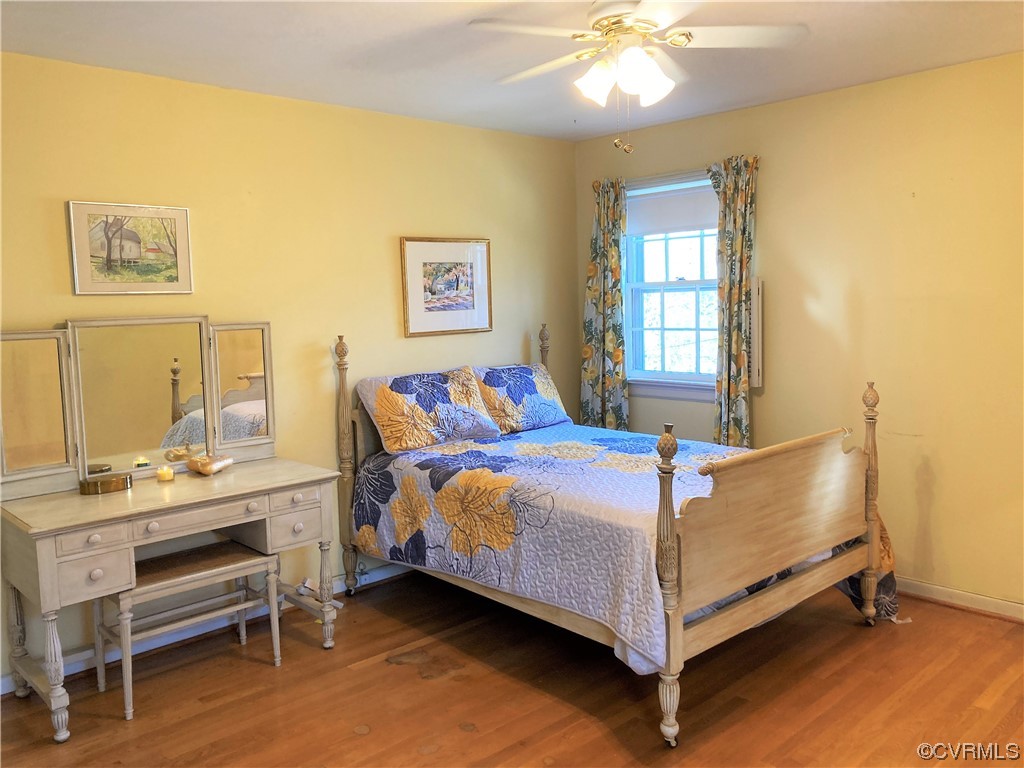 3401 Ellsworth Road Richmond, VA 23235 - Photo 17 of 39 a bed room with a bed and a chair