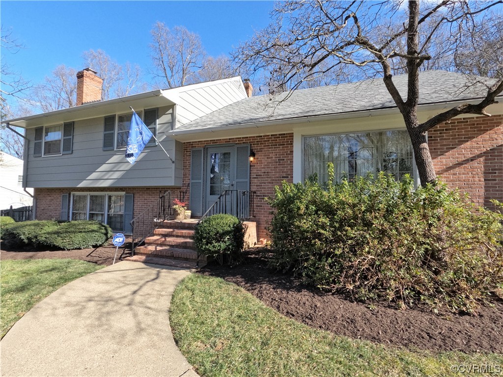 3401 Ellsworth Road Richmond, VA 23235 - Photo 2 of 39 a front view of a house with garden