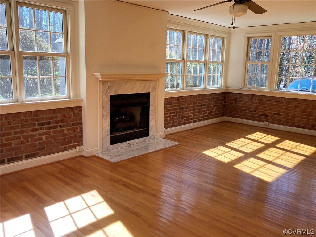 3401 Ellsworth Road Richmond, VA 23235 - Photo 24 of 39 a view of an empty room with wooden floor and a window