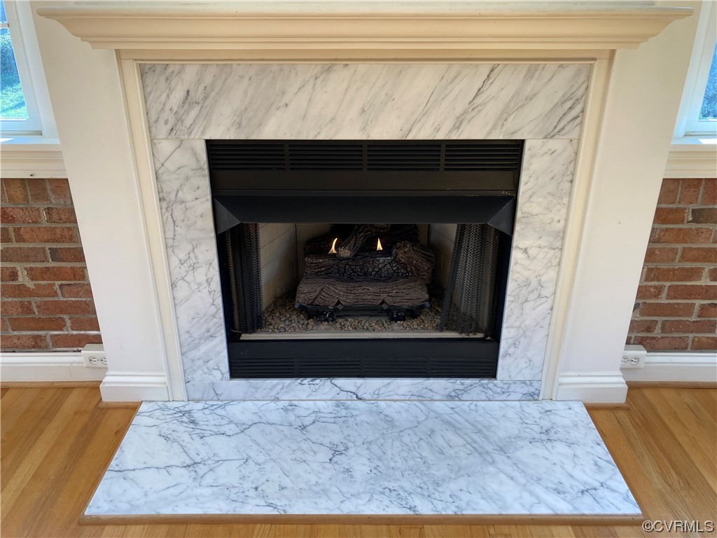 3401 Ellsworth Road Richmond, VA 23235 - Photo 25 of 39 a fireplace with a vase on top of it