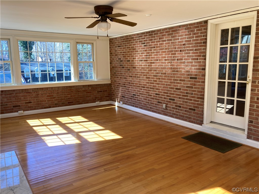 3401 Ellsworth Road Richmond, VA 23235 - Photo 26 of 39 a view of a room with wooden floor and windows