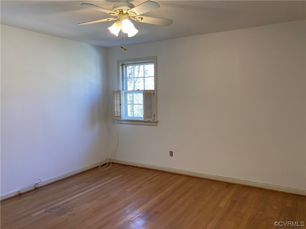 3401 Ellsworth Road Richmond, VA 23235 - Photo 30 of 39 wooden floor in an empty room with a window