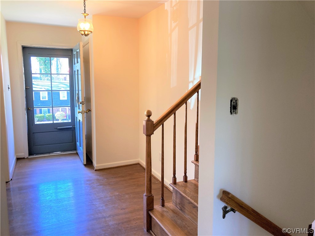 3401 Ellsworth Road Richmond, VA 23235 - Photo 3 of 39 a view of an entryway with wooden floor and door