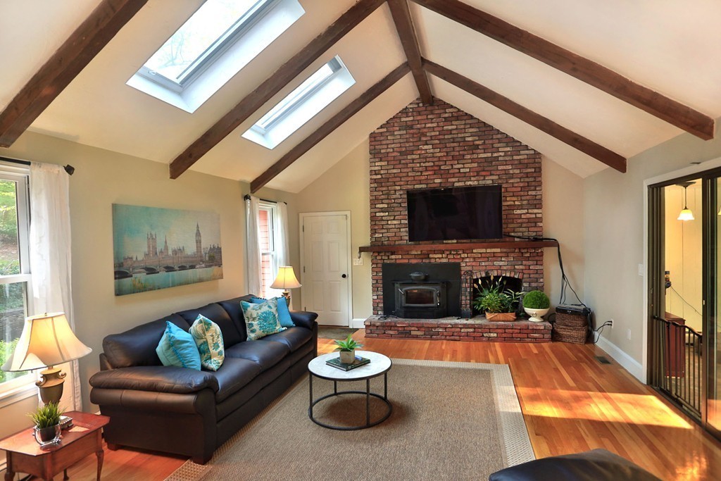 56 Rowley Road Boxford, MA 01921 - Photo 14 of 30 a living room with furniture and a fireplace
