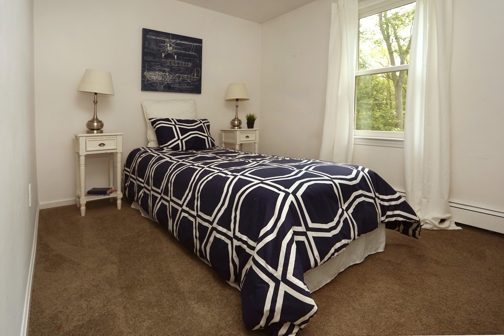 56 Rowley Road Boxford, MA 01921 - Photo 21 of 30 a bedroom with a bed and a window