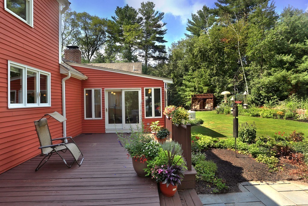 56 Rowley Road Boxford, MA 01921 - Photo 25 of 30 a front view of a house with garden and porch