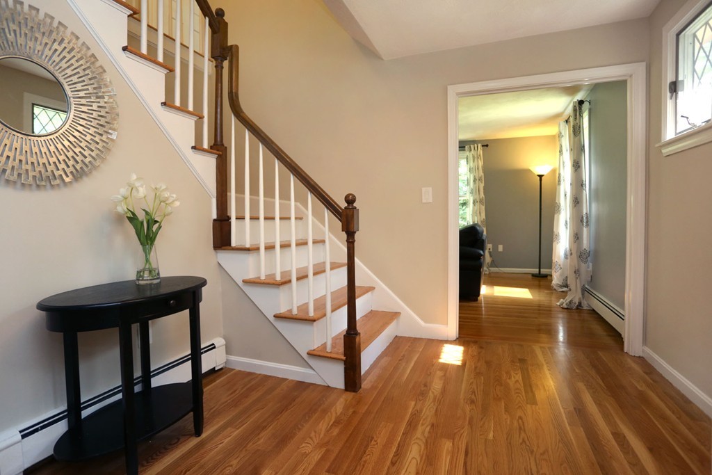 56 Rowley Road Boxford, MA 01921 - Photo 3 of 30 a view of entryway and hall with wooden floor