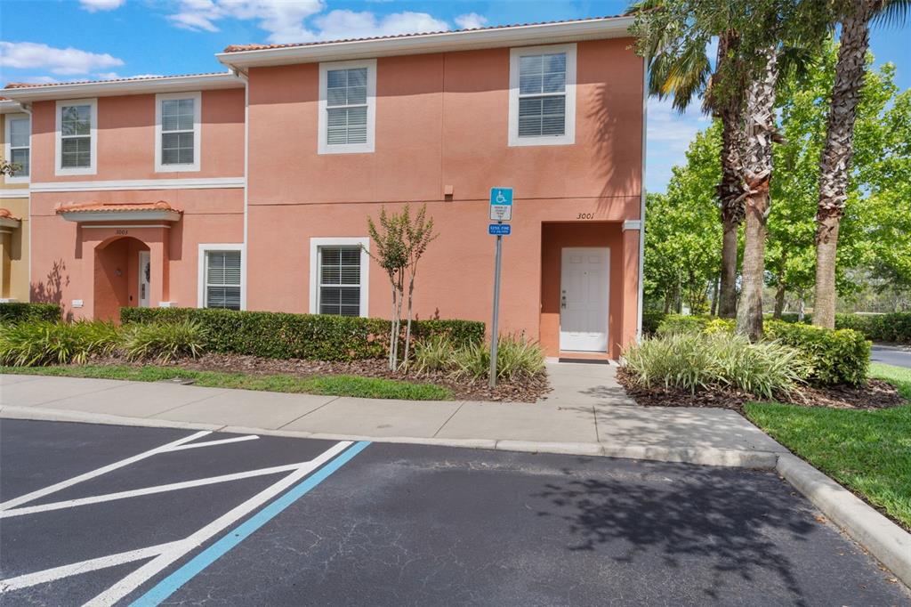 3001 Red Ginger Road Kissimmee, FL 34747 - Photo 1 of 1 a front view of a house with yard and tress