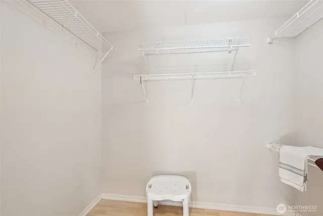 a room with window and furniture