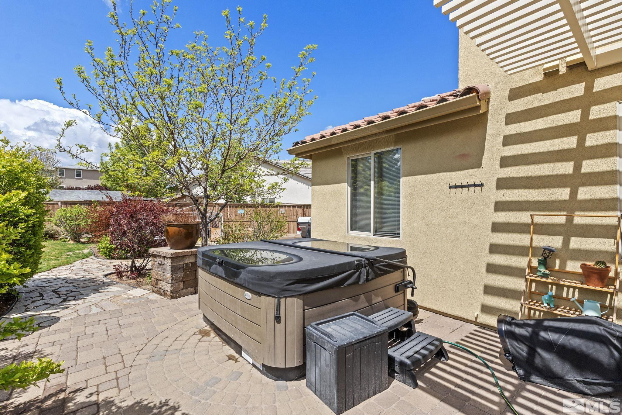10890 Sand Hollow Court Reno, NV 89521 - Photo 38 of 40 a view of a backyard with sitting area