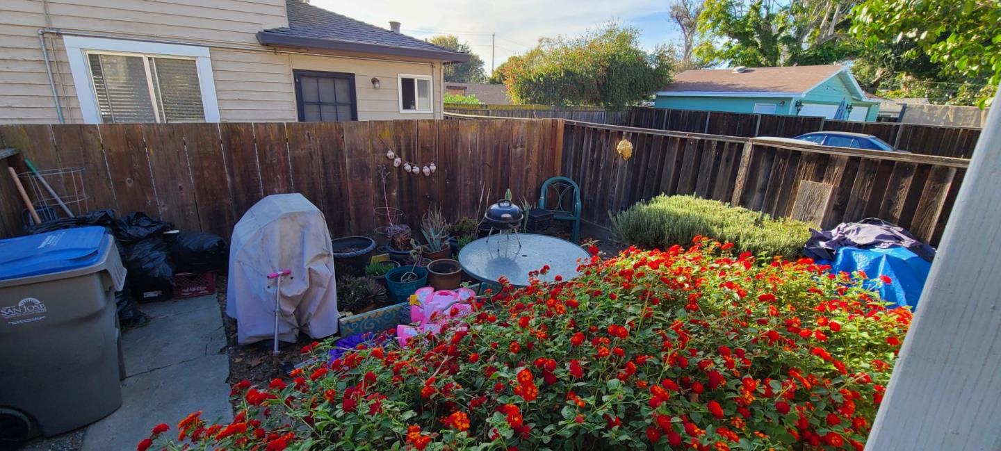 503 North 4th Street San Jose, CA 95112 - Photo 8 of 15 a backyard of a house with table and chairs