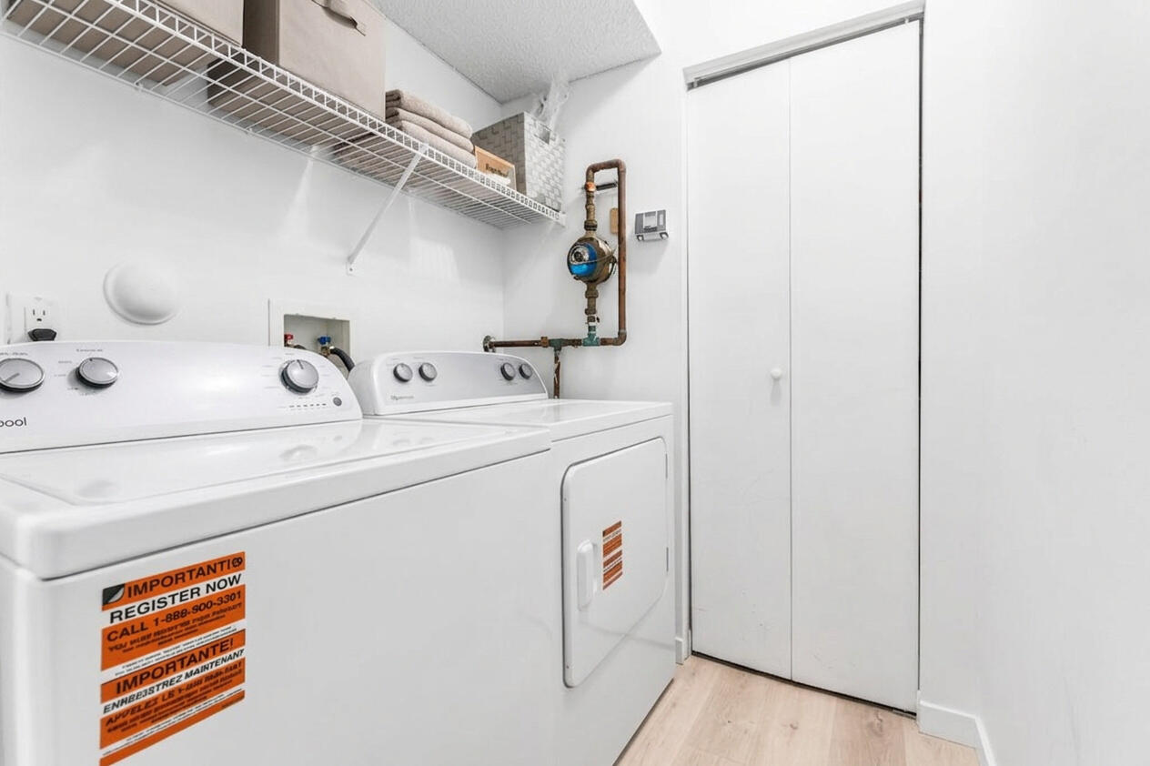 8721 Wiles Road, Unit 103 Coral Springs, FL 33067 - Photo 14 of 25 Decluttered Laundry Room