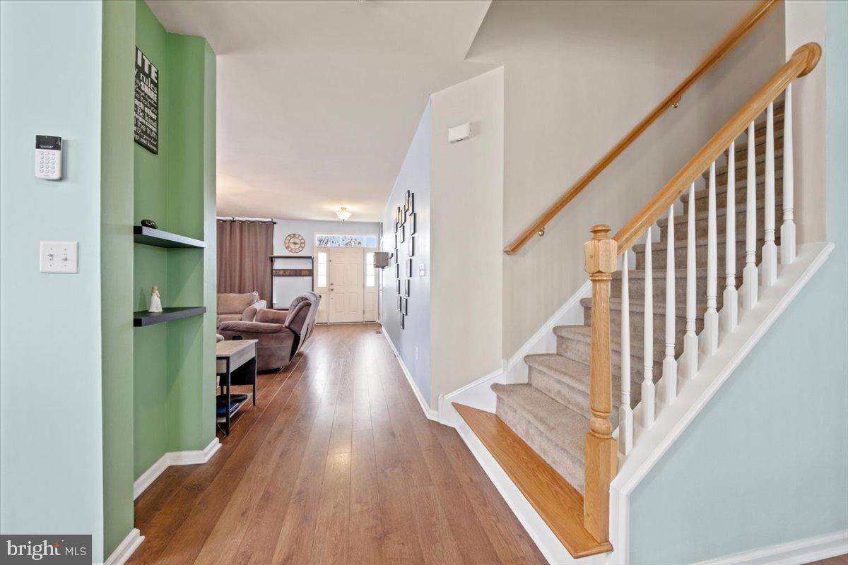 61 Homestead Drive Pemberton, NJ 08068 - Photo 14 of 40 a view of entryway and hall with wooden floor