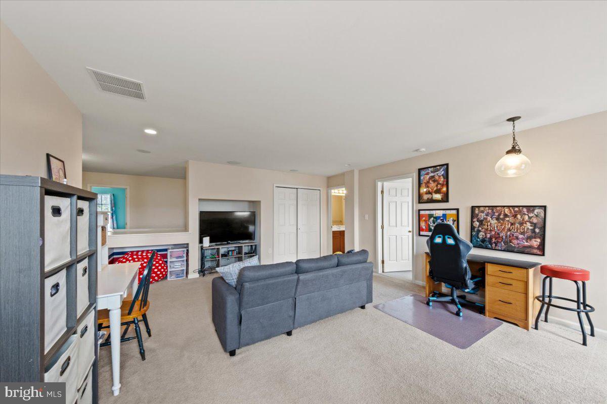 61 Homestead Drive Pemberton, NJ 08068 - Photo 17 of 40 a view of living room with furniture and a flat screen tv