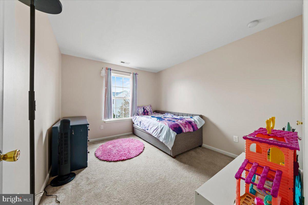 61 Homestead Drive Pemberton, NJ 08068 - Photo 19 of 40 a bedroom with furniture and a window