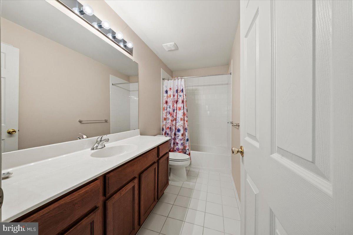 61 Homestead Drive Pemberton, NJ 08068 - Photo 28 of 40 a bathroom with a sink a toilet and shower