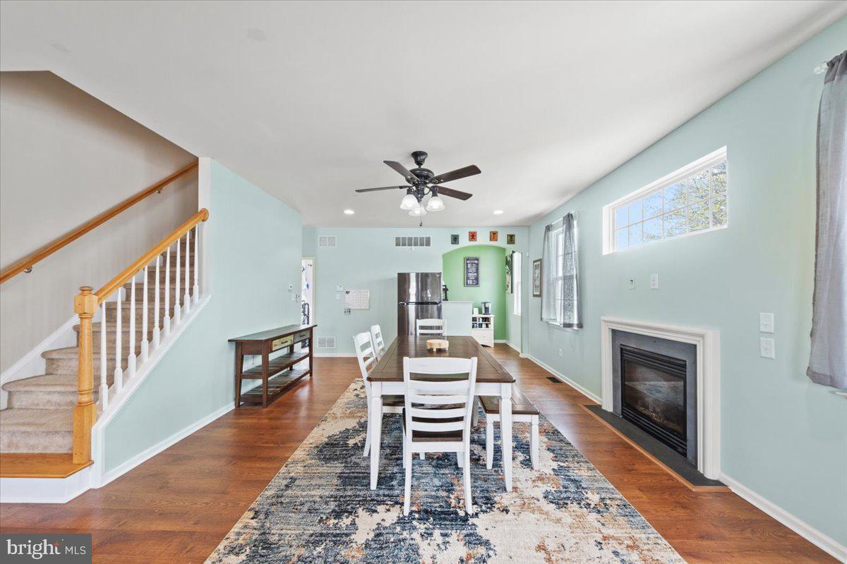 61 Homestead Drive Pemberton, NJ 08068 - Photo 9 of 40 a living room with furniture a fireplace and a table