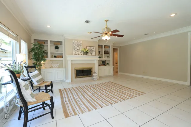 a view of a livingroom with furniture and a fireplace