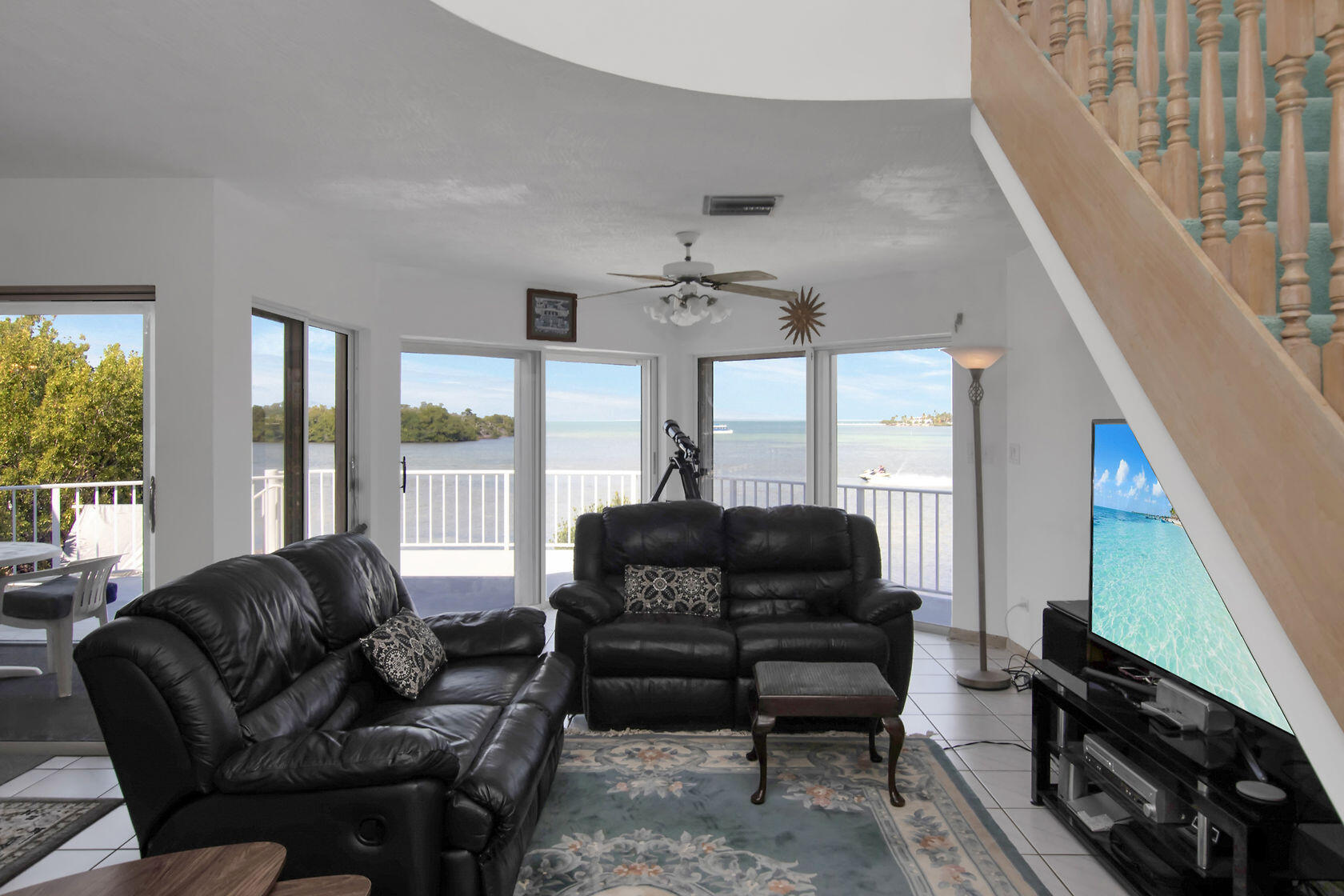 140 Brian Road Marathon, FL 33050 - Photo 4 of 54 a living room with furniture and a flat screen tv