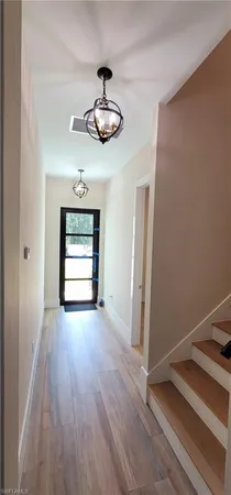 a bathroom with a sink toilet and mirror