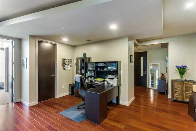a kitchen with stainless steel appliances granite countertop a refrigerator and stove top oven
