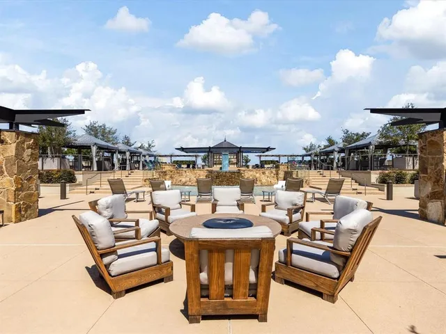 a view of a terrace with furniture