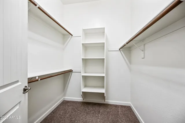 a view of an empty walk in closet