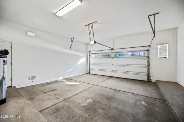 a view of a room with storage and utility room