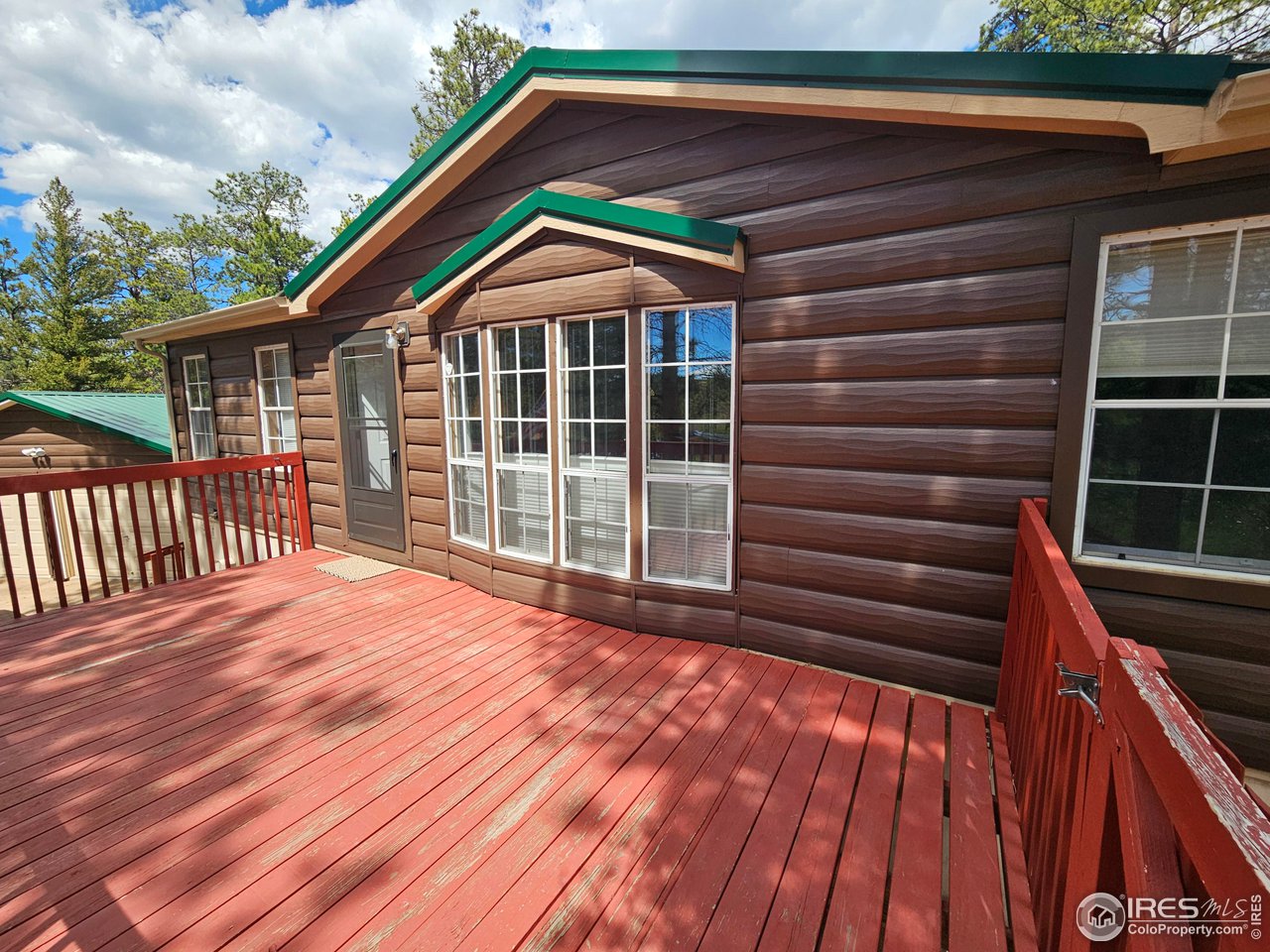 48 Sinisippi Road Red Feather Lakes, CO 80545 - Photo 19 of 31 Front Deck