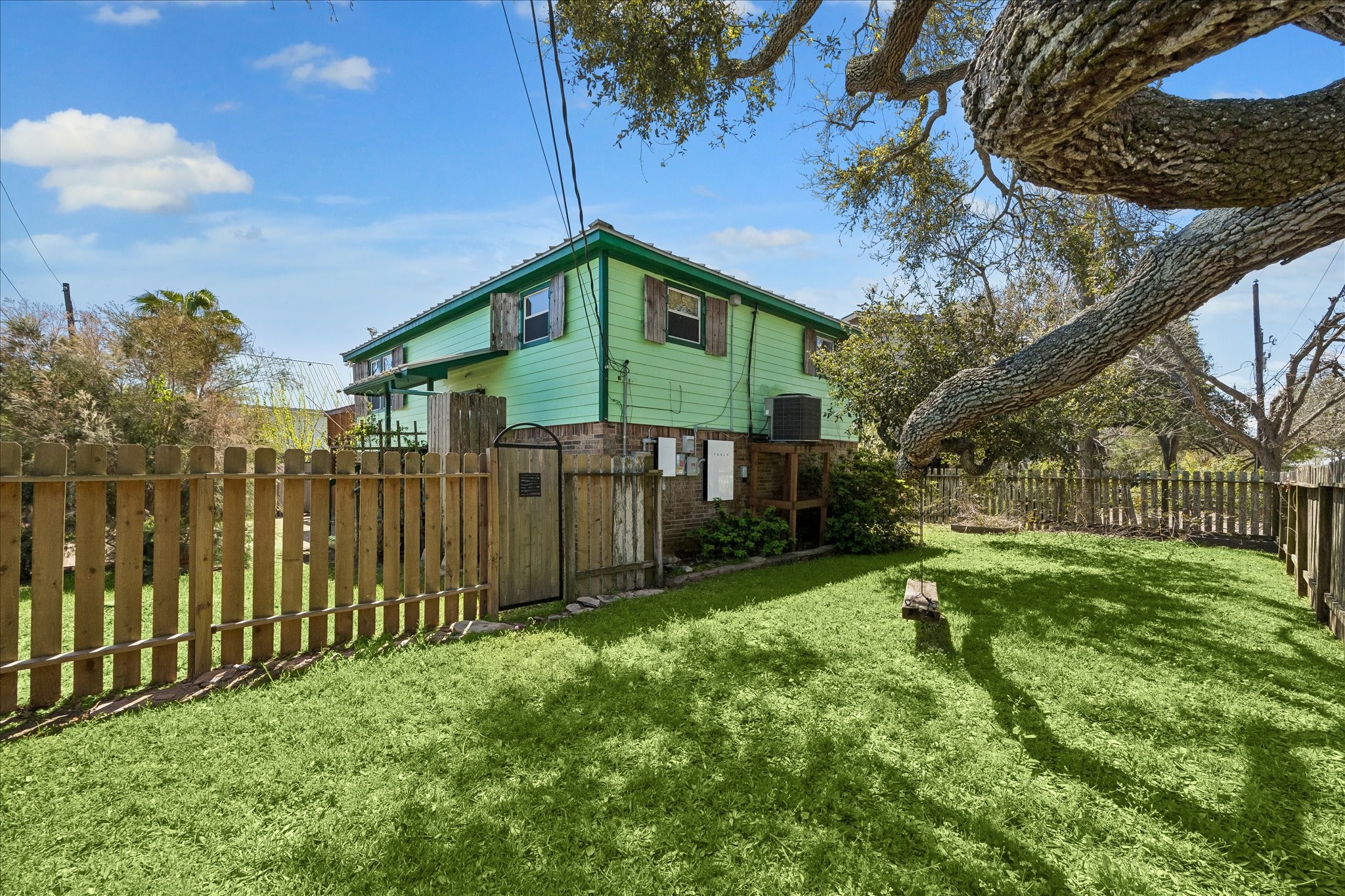 1009 3rd Street Seabrook, TX 77586 - Photo 17 of 20 a view of a house with a yard and plants