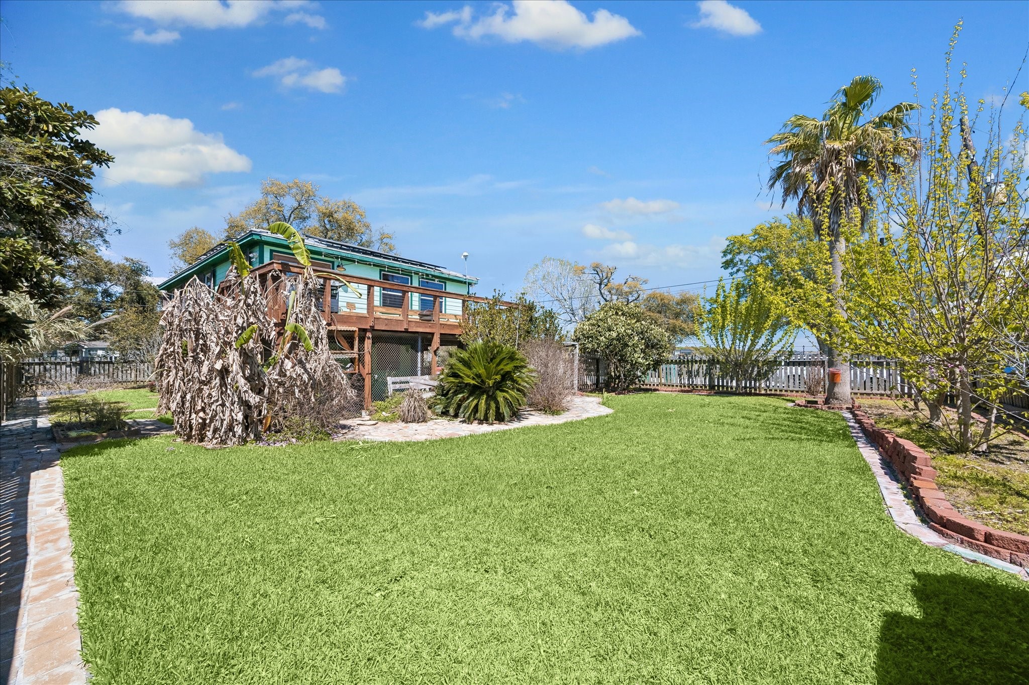 1009 3rd Street Seabrook, TX 77586 - Photo 18 of 20 a view of a house with a yard