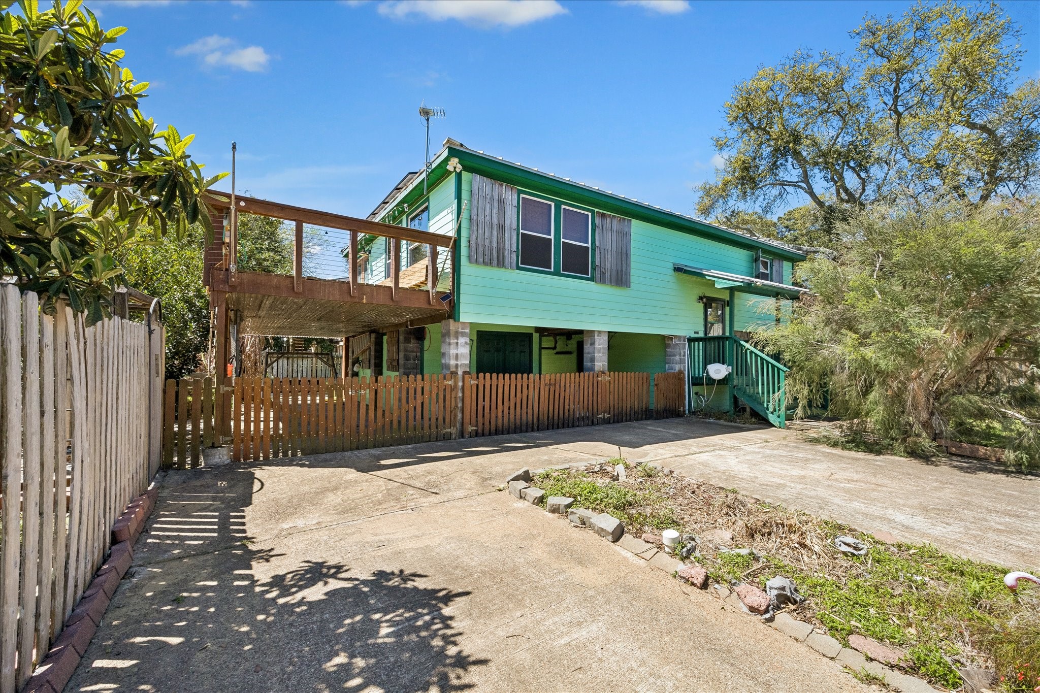 1009 3rd Street Seabrook, TX 77586 - Photo 2 of 20 a front view of a house with a yard