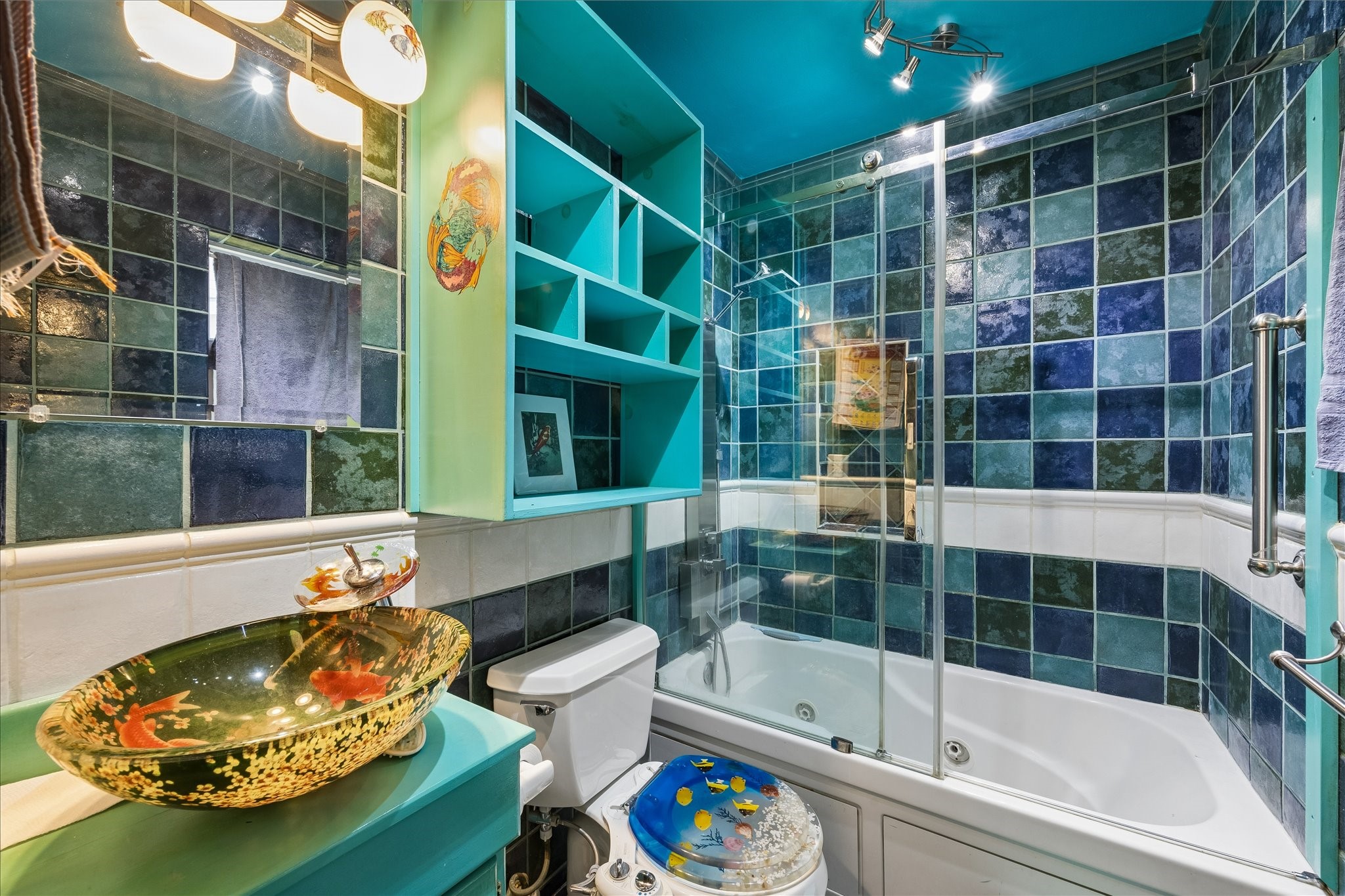 1009 3rd Street Seabrook, TX 77586 - Photo 10 of 20 a bathroom with a bathtub and a shower