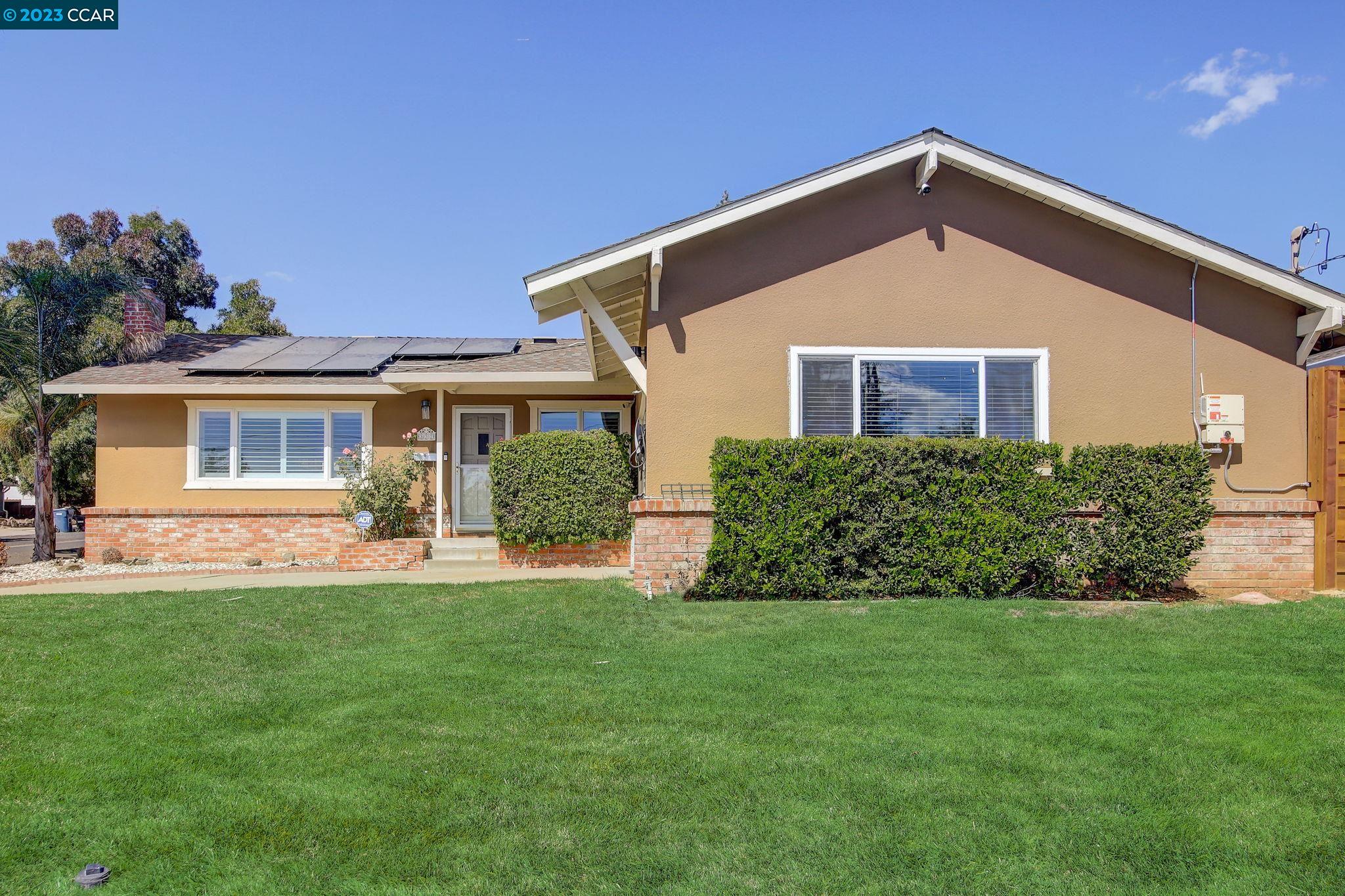 332 Michell Court Livermore, CA 94551 - Photo 1 of 1 a front view of a house with a yard
