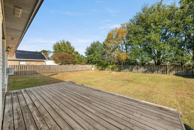 a view of a balcony with ocean view